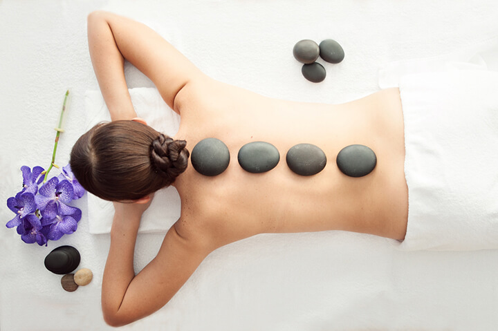 Massage body đá nóng có lịch sử phát triển từ lâu